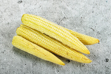Raw sweet baby corn heap