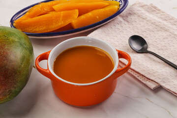 Sweet mango puree in the bowl