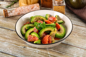 Salad with avocado and salmon