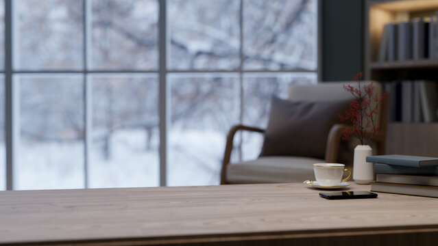 A close-up of a wooden coffee table in a cozy contemporary living room during winter.