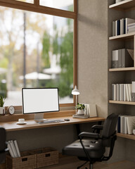 A comfortable, minimalist office featuring a computer with a white screen mockup on a wooden desk.