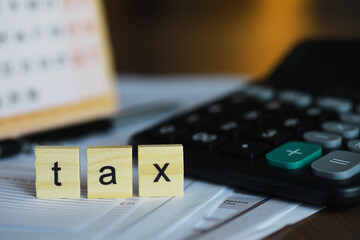 Tax Season Concept with Calculator and Documents - Financial Accounting and Planning