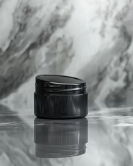Elegant black cosmetic jar reflecting beautifully on a marble surface, creating a luxurious feel.