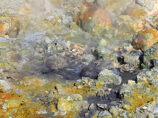 the colorful sulphur- encrusted rocks in the volcanic solfatara fields of krysuvik geothermal area in the mountains near harfnarfjordur, south of reykjavik, iceland