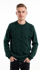 Fototapeta premium Young man in dark green cable knit sweater against white background