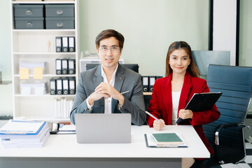 Portrait of success business people working together in modern office.