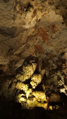 Amazing stalactites and stalagmites in Thien Cung Cave, known as Heaven's Cave, in Ha Long Bay, Vietnam.