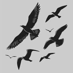 group of birds silhouette vector design art and illustration
