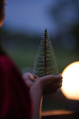 A little girl is happy to join the christmas day.
