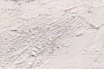 Rough large light brushstrokes of oil paint on canvas. Artistic vintage background
