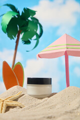 Ad image of a moisturizer product with a beach concept. A frontal view of a white jar with a black...
