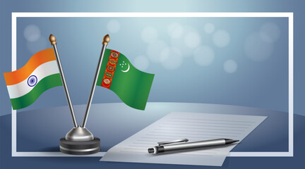 India and Turkmenistan National flags on small table with bokeh background, cooperative relationship