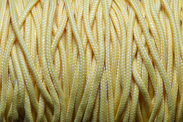 Yellow climbing rope as a texture