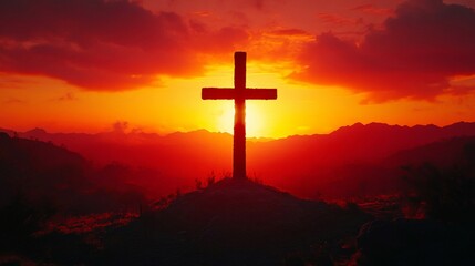 Sunset Cross Silhouette Over Majestic Mountains