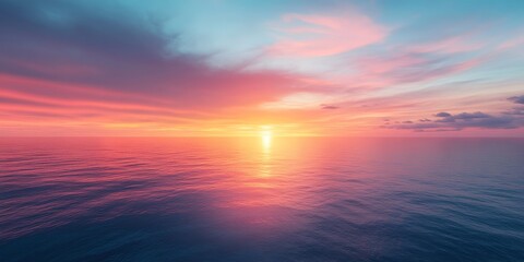 Obraz premium Breathtaking sunset over the ocean, illuminating the vast open sky with vibrant colors, creating a stunning visual display that captures the serene beauty of the ocean at dusk.