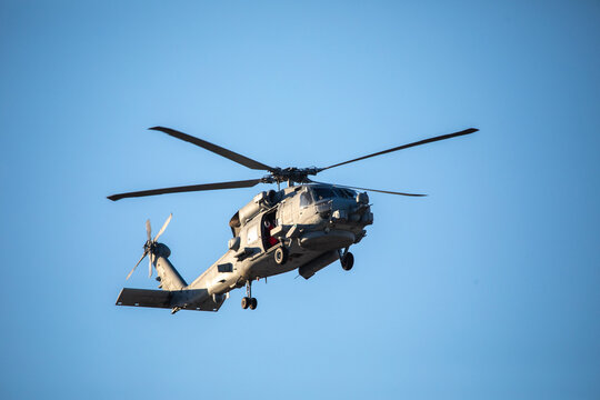 A U.S. Navy Helicopter Flying Overhead