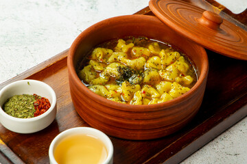 Delicious homemade dumplings served with flavorful dipping sauces