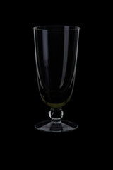 empty champagne flute glass on black background
