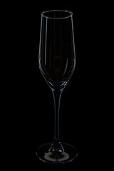 empty champagne flute glass on black background