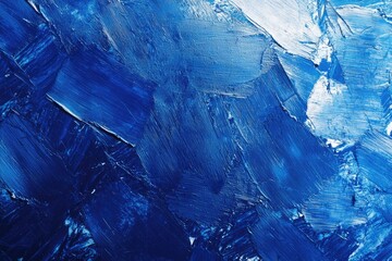 Abstract blue textured brush strokes on canvas with reflective light