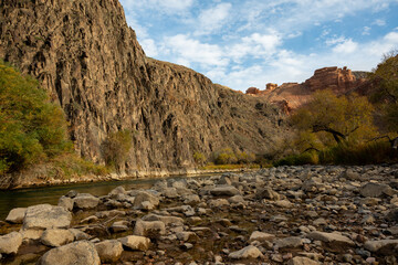mountain river in a gorge with rocky banks