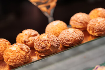 A contemporary hotel dining area featuring a sleek buffet setup.