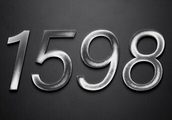 Chrome metal 3D number design of 1598 on grey background.