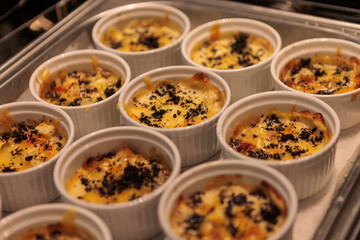 A contemporary hotel dining area featuring a sleek buffet setup.