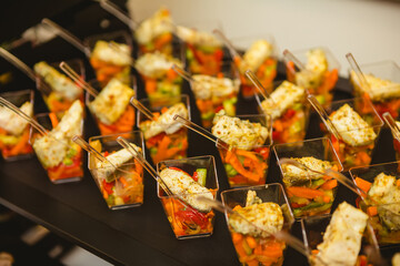 A contemporary hotel dining area featuring a sleek buffet setup.