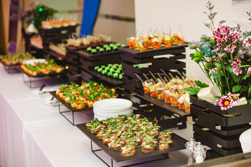 A contemporary hotel dining area featuring a sleek buffet setup.