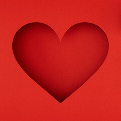 A square cut-out heart silhouette on a red background, capturing the spirit of love and romance, ideal for Valentine's Day 