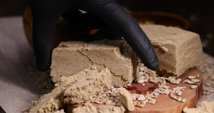 halva made from roasted sunflower seeds and crushed into one solid mass, a sweet delicious dessert made from fried sunflower seeds