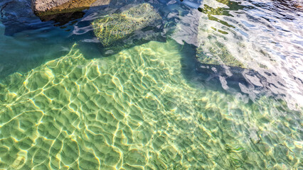 clear sea water and rocks