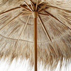 a thatched umbrella with a wooden frame