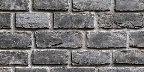 Grey brick wall texture features a rich surface that showcases the unique characteristics of grey bricks. This texture of grey brick wall offers visual intrigue and depth for various design needs.