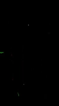 A detailed old film damage overlay with realistic dust, scratches, and imperfections on a vertical black screen