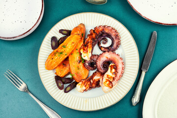Delicious grilled octopus and sweet potato.