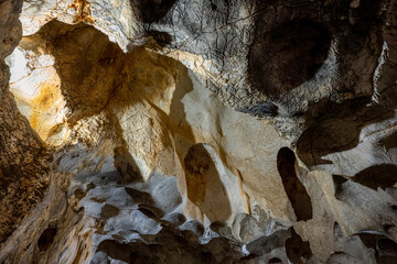 Interior of the large hall of old Karain cave, hidden in Mediterranean region. Confirms human...