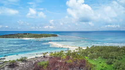 Panoramic aerial view of Île Plate (Flat Island) and Gabriel island are picturesque islands in the Indian Ocean, located off the northern coast of Mauritius.