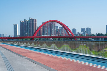Fototapeta premium Landmark building of Rainbow Bridge in downtown Deyang City, Sichuan Province, China