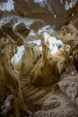 Interior of the large hall of old Karain cave, hidden in Mediterranean region. Confirms human habitation since the early Paleolithic age between 150,000 and 200,000 years ago.Yagca, Antalya, Turkey.