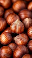 Obraz premium A pile of hazelnuts sitting on top of each other