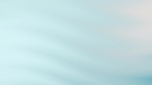 A serene abstract background with a soft, diffused gradient of pale blue hues. The surface appears smooth and almost hazy, creating a sense of calm and tranquility.