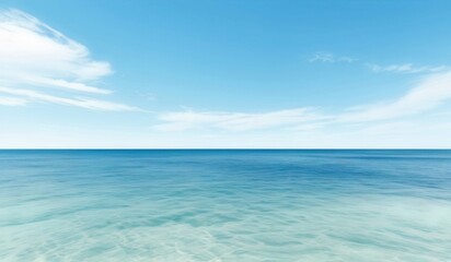 Obraz premium view of a blue ocean with a clear sky