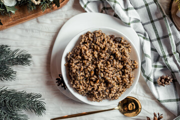Christmas Kutia Ukrainian Christmas holiday dish, wheat with honey, poppy seeds, raisins, dessert, Scandinavian style, ethnic dishes