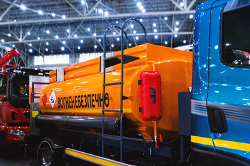 A freight transport vehicle designed for the transportation of fuel. The truck features a prominent...