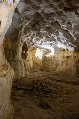 Interior of the large hall of old Karain cave, hidden in Mediterranean region. Confirms human habitation since the early Paleolithic age between 150,000 and 200,000 years ago.Yagca, Antalya, Turkey.