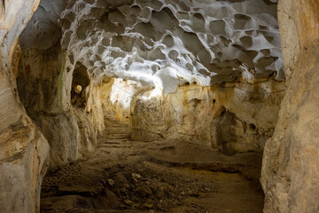 Interior of the large hall of old Karain cave, hidden in Mediterranean region. Confirms human...