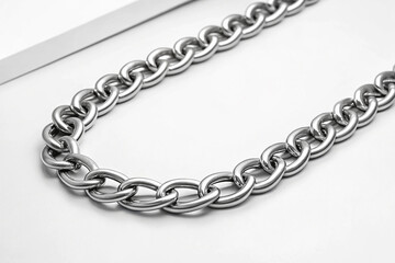 Obraz premium Metal chain on a white background.