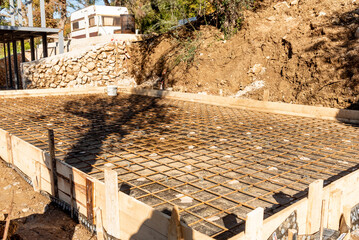 Construction site, residential building build, metal armature concrete structure